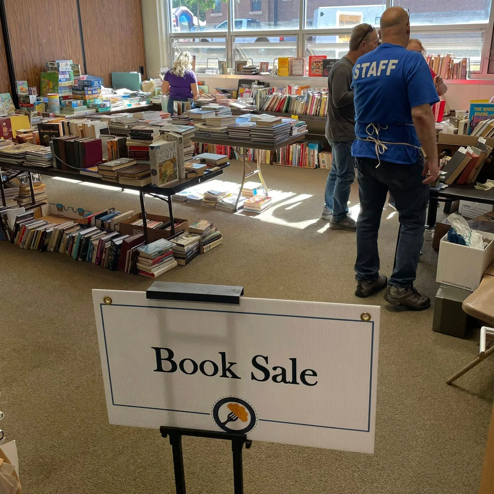 Book sale tables in the parish center